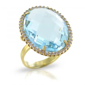 Anello in oro con zircone e quarzo centrale effetto acquamarina - gallery