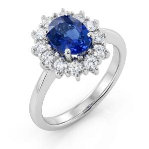 Anello classico in oro con Zaffiro da un carato e mezzo e contorno di diamanti - gallery