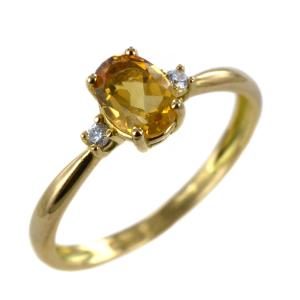 Anello in oro giallo con zircone ovale giallo e zirconi bianchi 