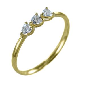 Anello trilogy in oro giallo con zirconi a cuore