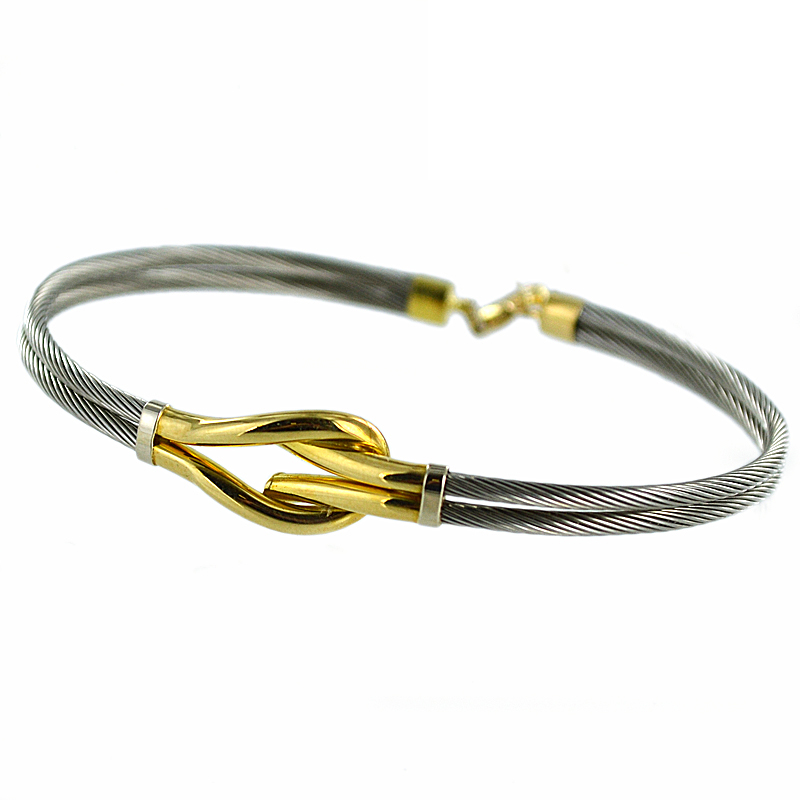 Bracciale rigido in acciaio e oro giallo