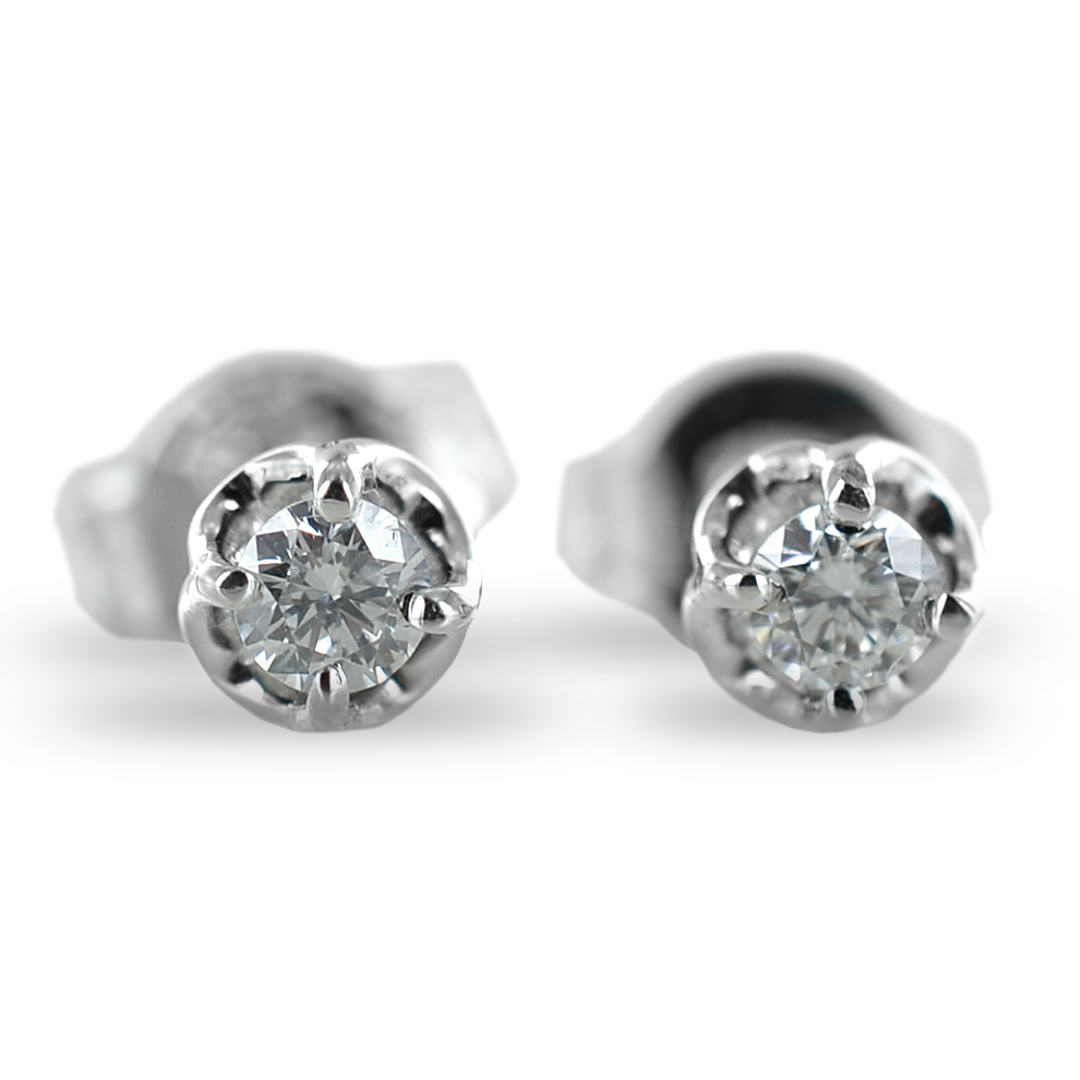 Orecchini punto luce in oro e diamanti ct 0.19 G VS