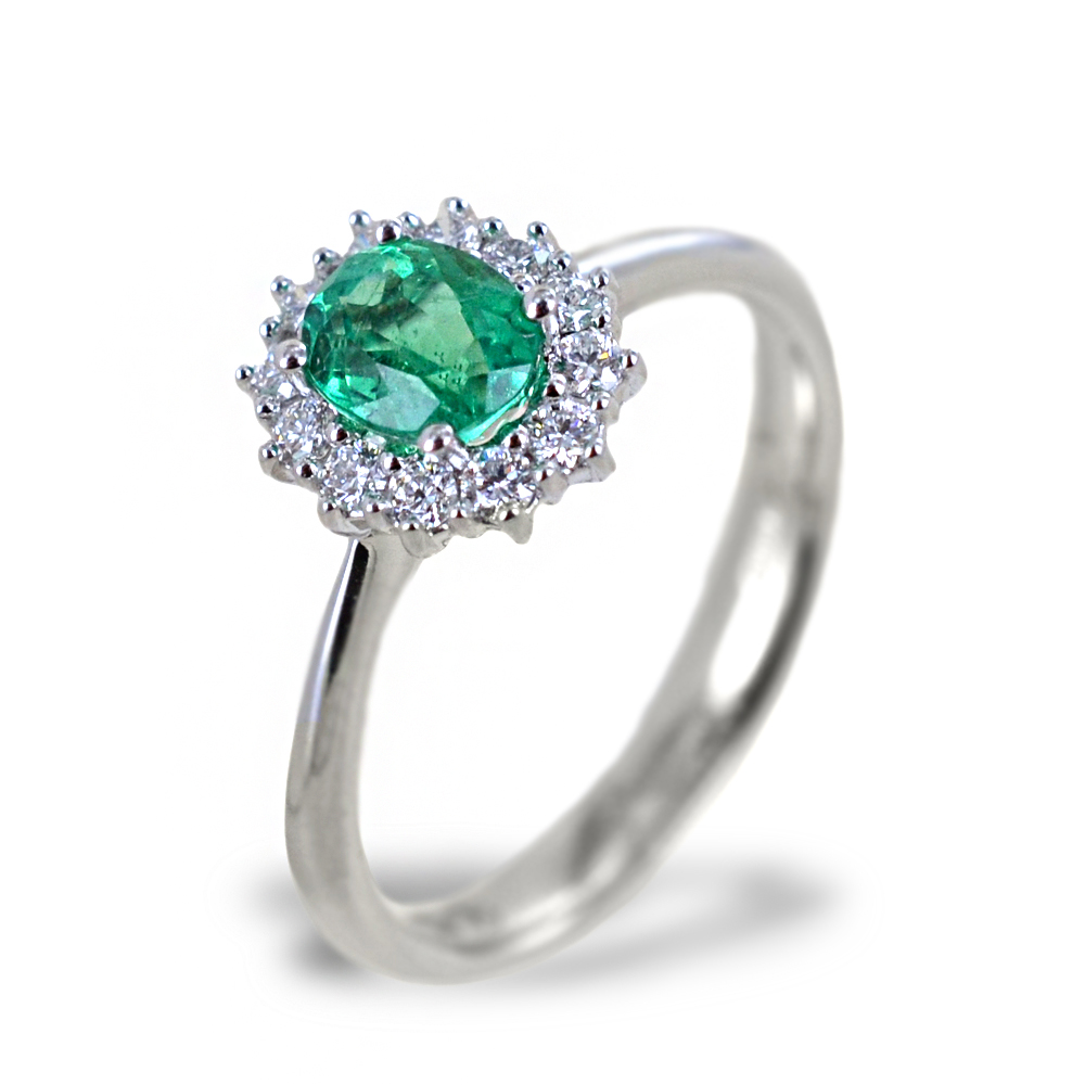 Anello con Smeraldo centrale e contorno di diamanti