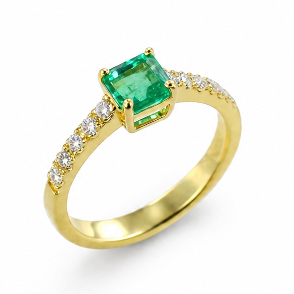 Anello in oro giallo con Smeraldo e Diamanti sul gambo