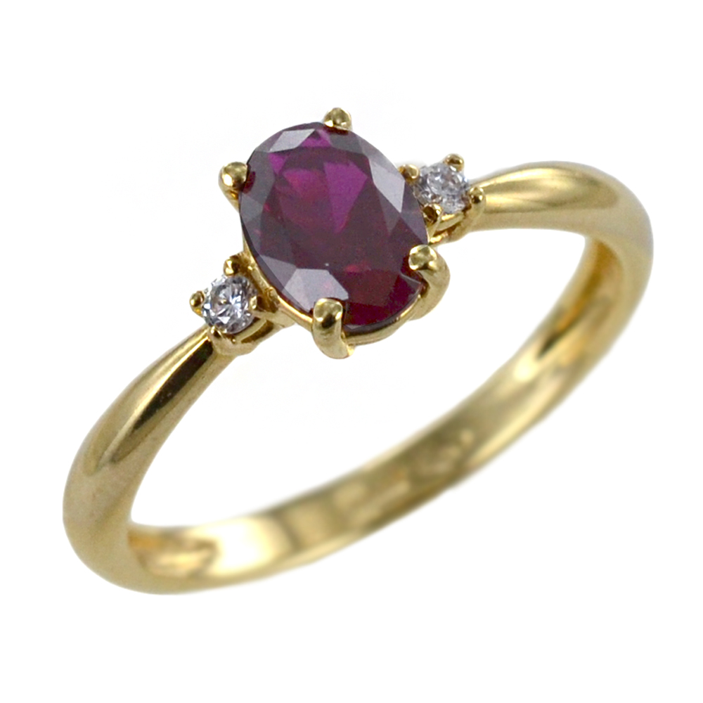Anello in oro giallo con zircone ovale rosso e zirconi bianchi 