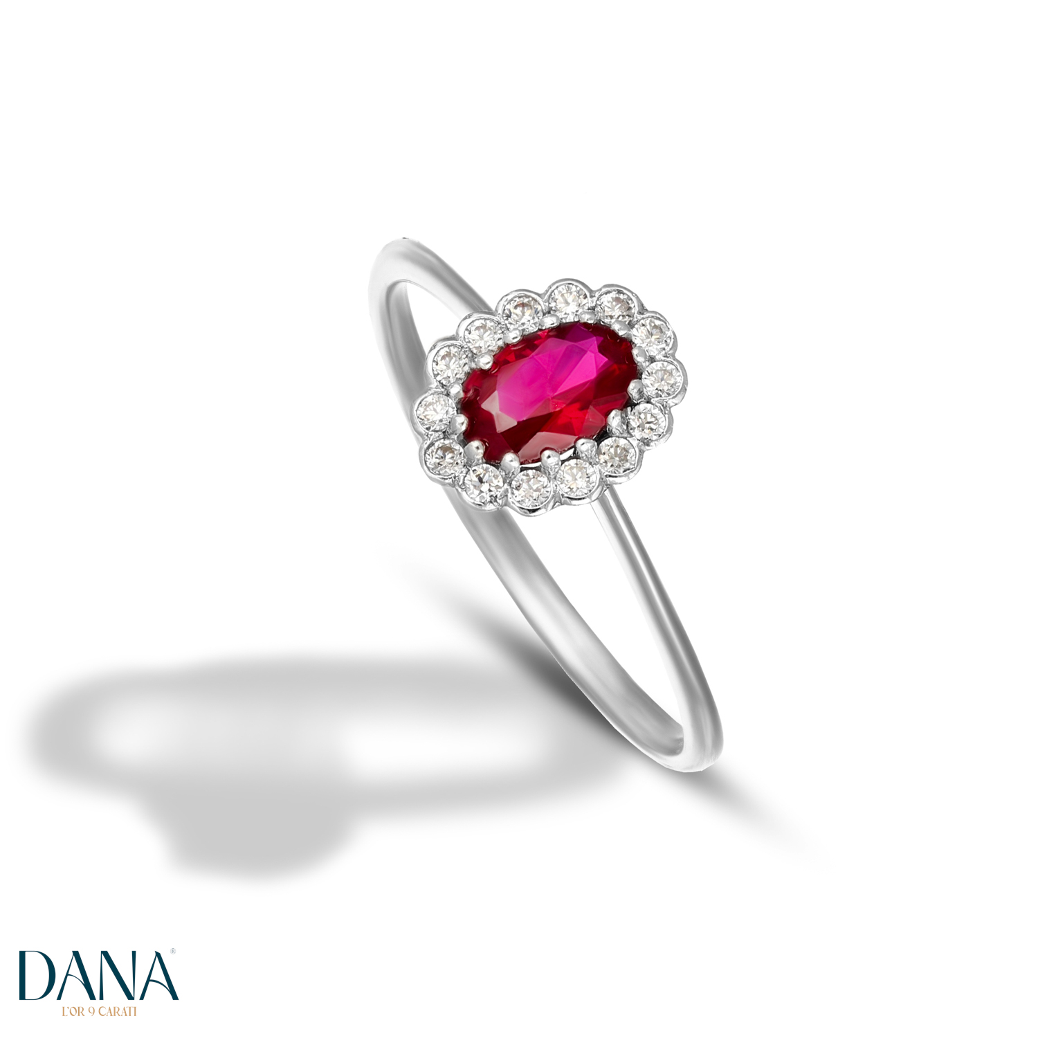 Anello pietra rossa con contorno di zirconi in oro bianco 9 kt