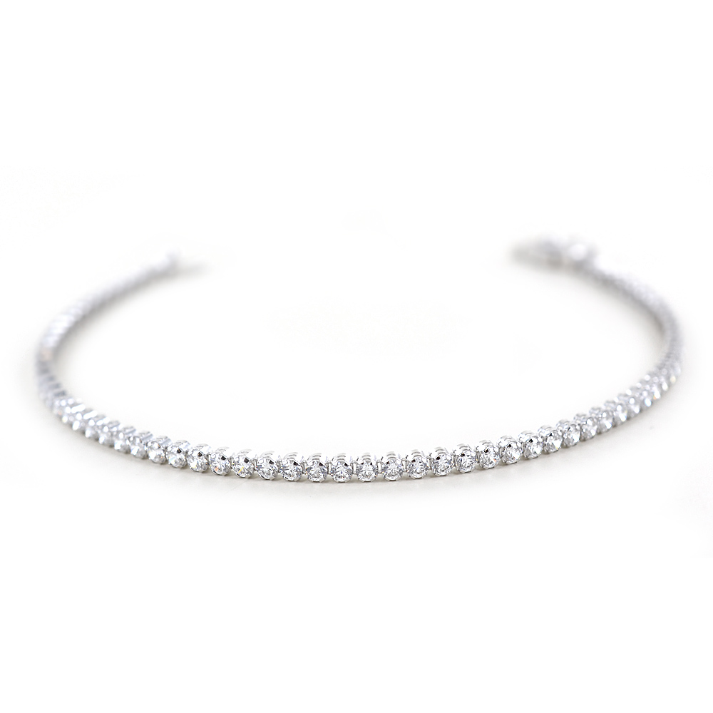 Bracciale Tennis in oro con zirconi - castoni rotondi