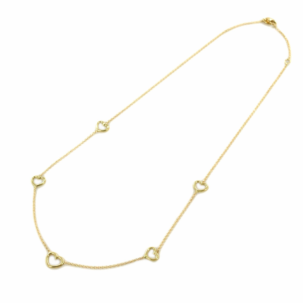 Collana con cuori traforati in oro giallo