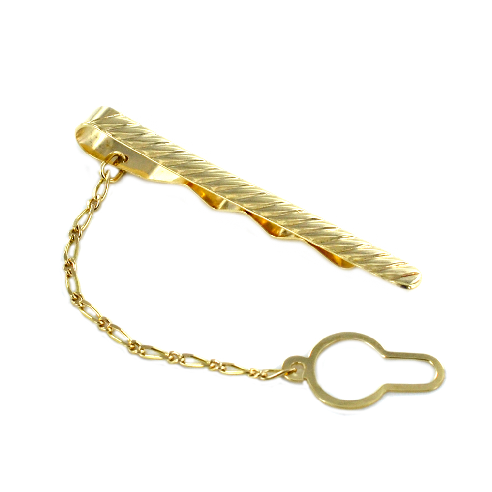 Fermacravatte in oro giallo