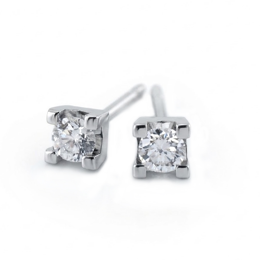 Orecchini punto luce con diamanti 0.17 carati