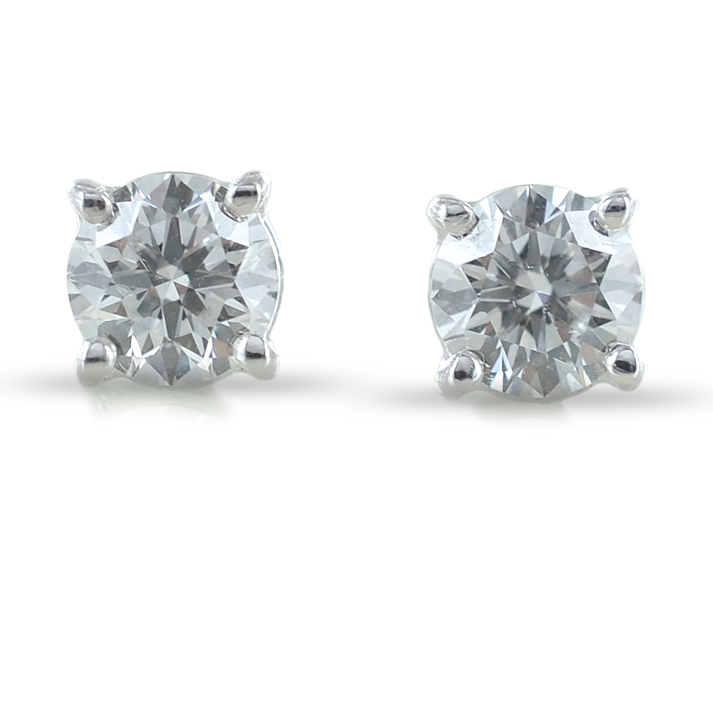 Orecchini punto luce grande diamanti carati 0,60 F color
