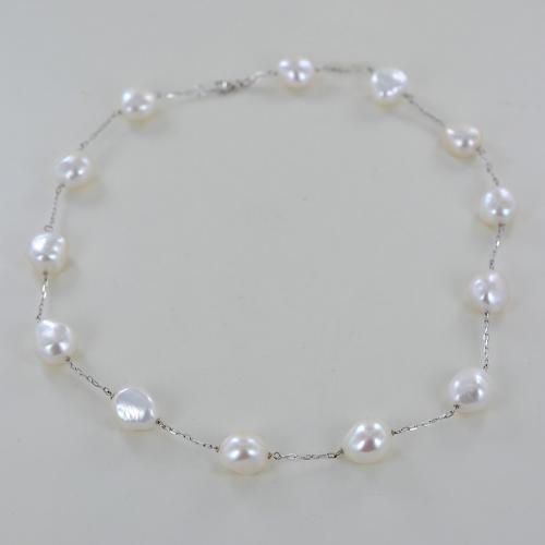 Collana d perle. Perle barocche grge e perle d'acqua dolce con un