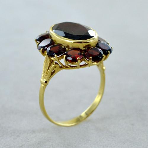 Anello oro discount giallo e granato