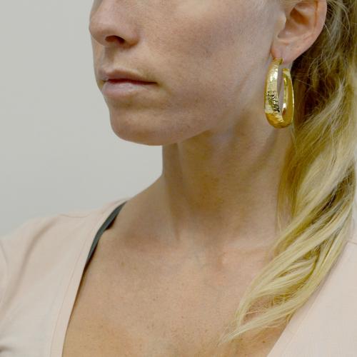 Orecchini a cerchio grande Unoaerre in bronzo Giallo colore oro