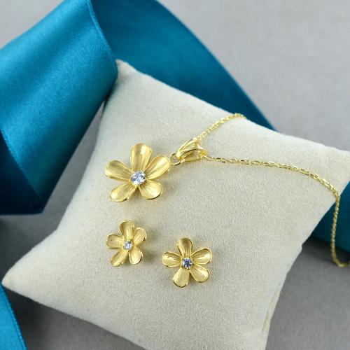 Orecchini punto luce in argento dorato con zirconi piccoli | - L