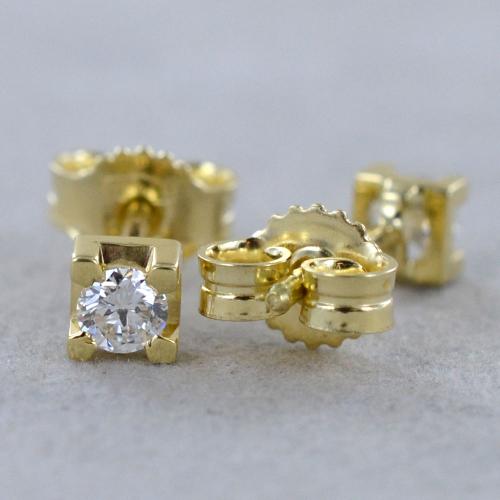 Orecchini punto luce oro giallo e diamanti