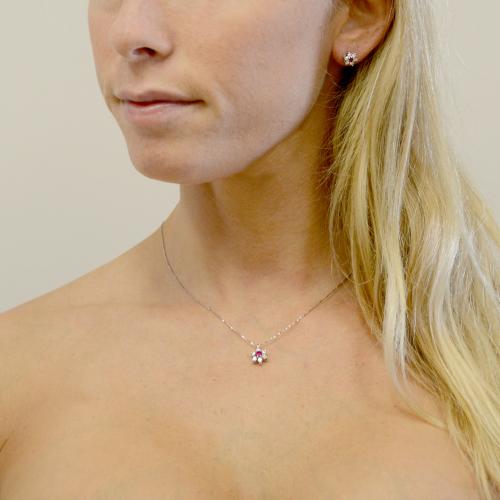 Orecchini con ciondolo a forma di stella in oro e argento