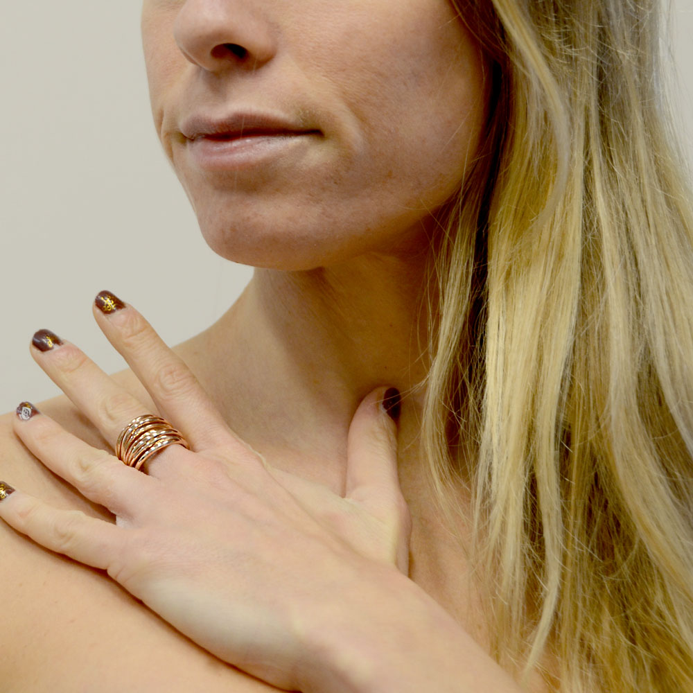 Anello Unoaerre in Argento Rosa a fascia con fili intrecciati Gioielloro