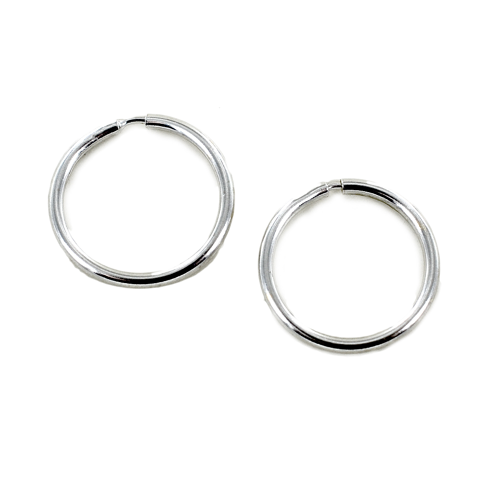 Orecchini in oro bianco 18Kt 750/1000 a cerchio lucidi da donna Orecchini in oro bianco 18Kt 750/1000 a cerchio lucidi da donna