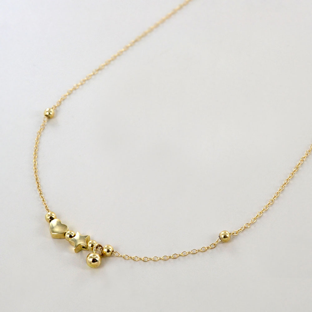 Parure Gioielli bracciale e collana con charms in oro giallo